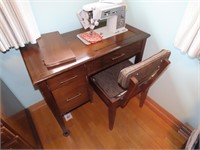 Singer sewing machine w/desk & chair.