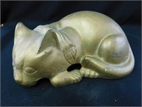 Cast iron hollow lying down cat, painted gold