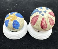 (2) possibly repainted Chinese marbles