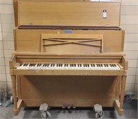 Baldwin upright piano with piano dolly.