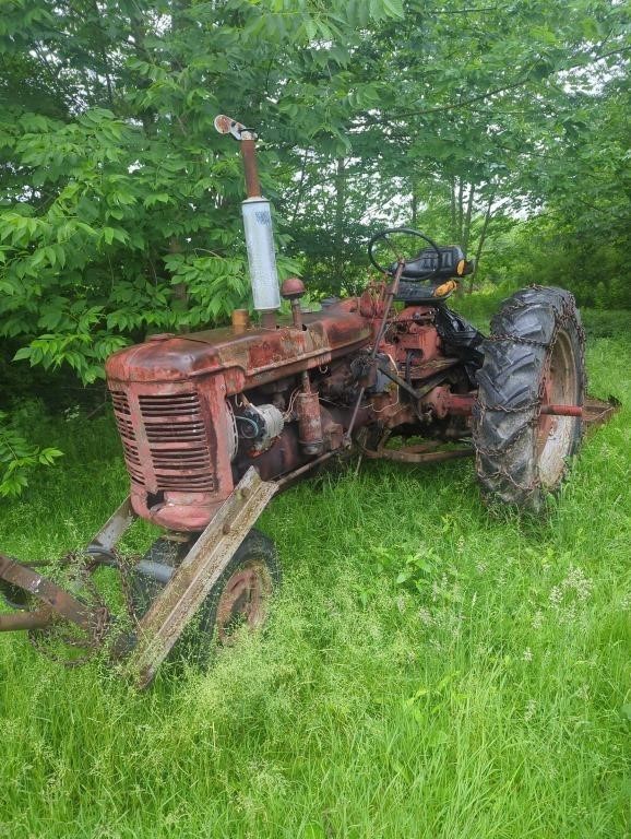 Farmall tricycle tractor with 4-ft brush hog