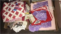 Two boxes of linens and quilt work pieces (420)