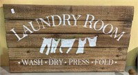 Wooden laundry room sign measures 24 x 14.    1545
