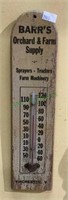 Vintage thermometer on wood back advertising