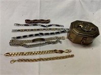 Men’s bracelets and container