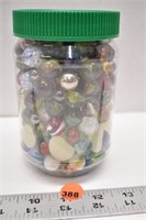 Small jar of marbles and glow in the dark "rocks"