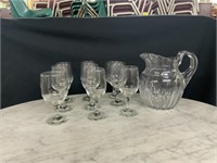GLASS PITCHER AND 9 STEMMED GLASSES