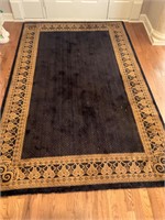 5 x 7.5 area rug- needs cleaned