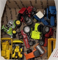 One small box of toy, vehicles, tractors, and such