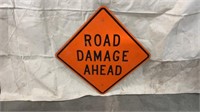 "Road Damage Ahead" Sign