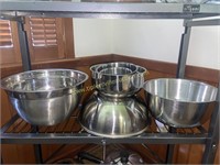 Group of stainless kitchen bowls