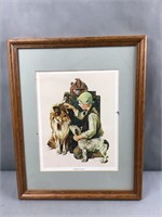 Framed canvas painting of child and dogs