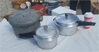 Two pressure cookers and a canner
