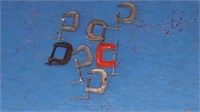 Bag of 7 mini clamps approximately 2.5 in wide