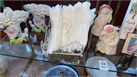 Shelf of decorative items, napkin holder and