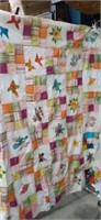 Approximately 60 x 53 cotton quilt topper,
