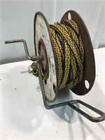 Electric fence ribbon and roller