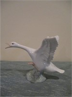 LLardo bird figurine .