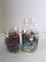 Two Glass Canisters of Decorative Glass stones