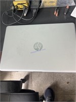 HP laptop with charger.