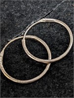 $100 Silver Hoop Earrings