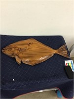 Beautiful wooden carved carp. Fin has ha dim or