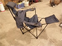 FOLDING CAMP CHAIR, REPAIRED W/ ZIP TIES