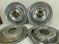4 vintage Buick hub caps