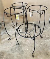 Four Plant Stands in Garage