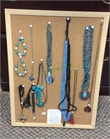 Beaded jewelry includes pendants and corkboard