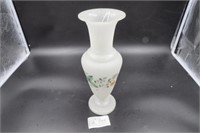 White glass vase has crack