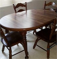 Pine table and 5 chairs, dark-stained, 2 leaves