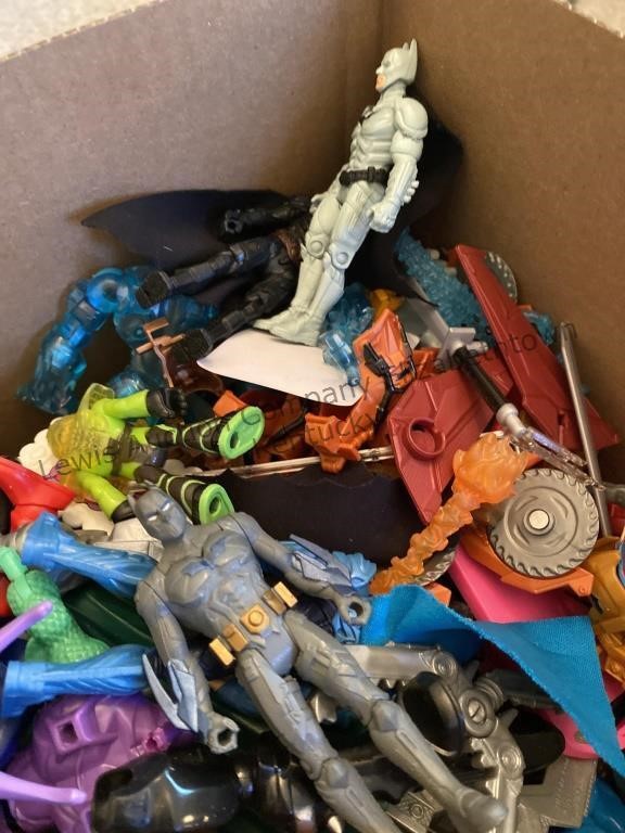 Box of action figures Batman, army men and more