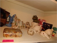 Shelf contents: assorted porcelain figurines,