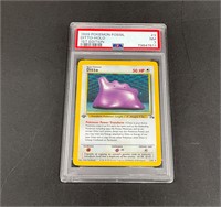 Graded NM 7 Pokemon '99 Ditto 1st Ed Fossil #3