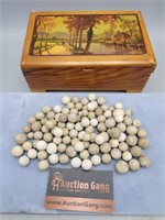 Wood Box Filled With Clay Marbles