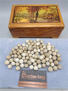 Wood Box Filled With Clay Marbles