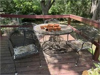 Vintage wrought iron table and 4 chairs
