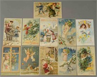 A SELECTION OF 11 HOLD TO LIGHT CHRISTMAS POSTCARD