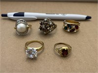 5 gold plated rings - various stones