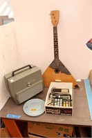 Bargain Lot: Vintage Projector, Balalaika Guitar