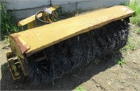 Sweepster 6' hydraulic sweeper attachment.