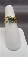 14K Yellow gold rings featuring aqua colored