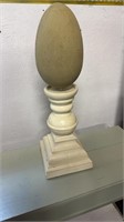 Heavy stand with a large cut stone egg , 20