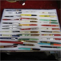 Showcase of vintage advertising pens & pencils.