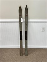 Pair of Tubbs Painted Youth Wooden Skis
