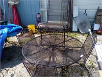 Wrought iron table with 4 chairs