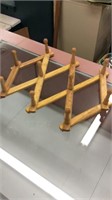 Wooden fold up hat rack