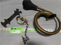 Brass horn, padlock and antique wrench