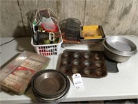 Lot of pie pans; cupcake tins; strainers; baking